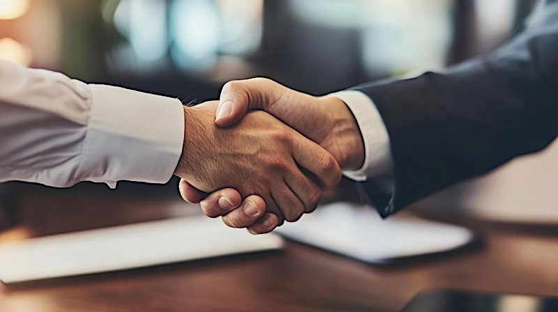 director shakes hand with insolvency practitioner